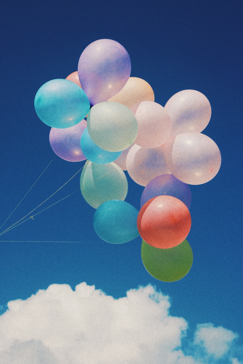 white, blue, and purple balloons